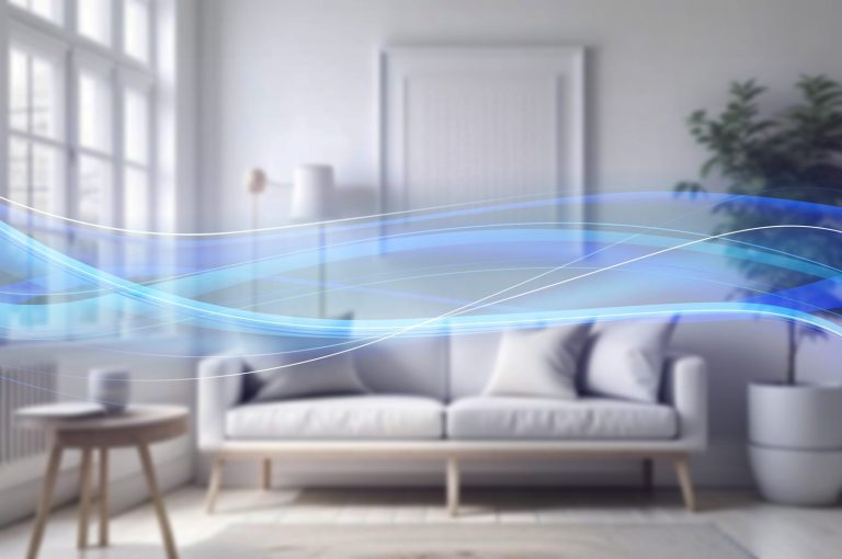 A living room with a couch with blue wavy lines overtop the image, indicating airflow.